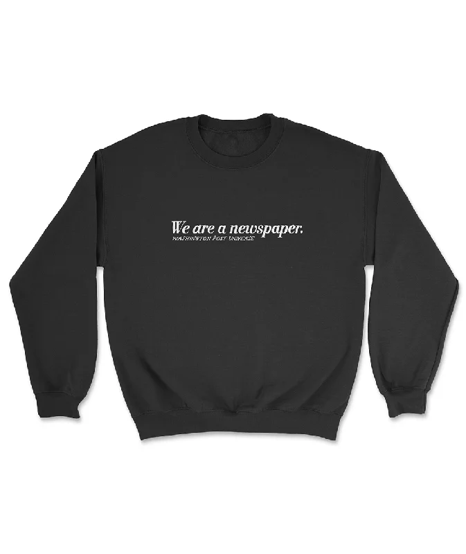 Budget Friendly We are a newspaper Crewneck